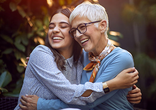 Mother and daughter having fun and embracing each other. 